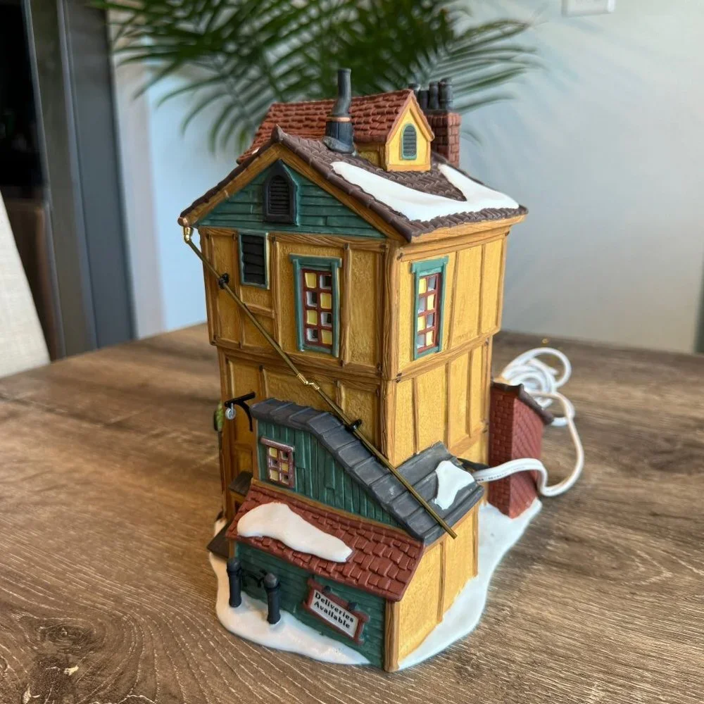 Dept 56 “J. Lytes Coal Merchant” Dickens Village Collection.